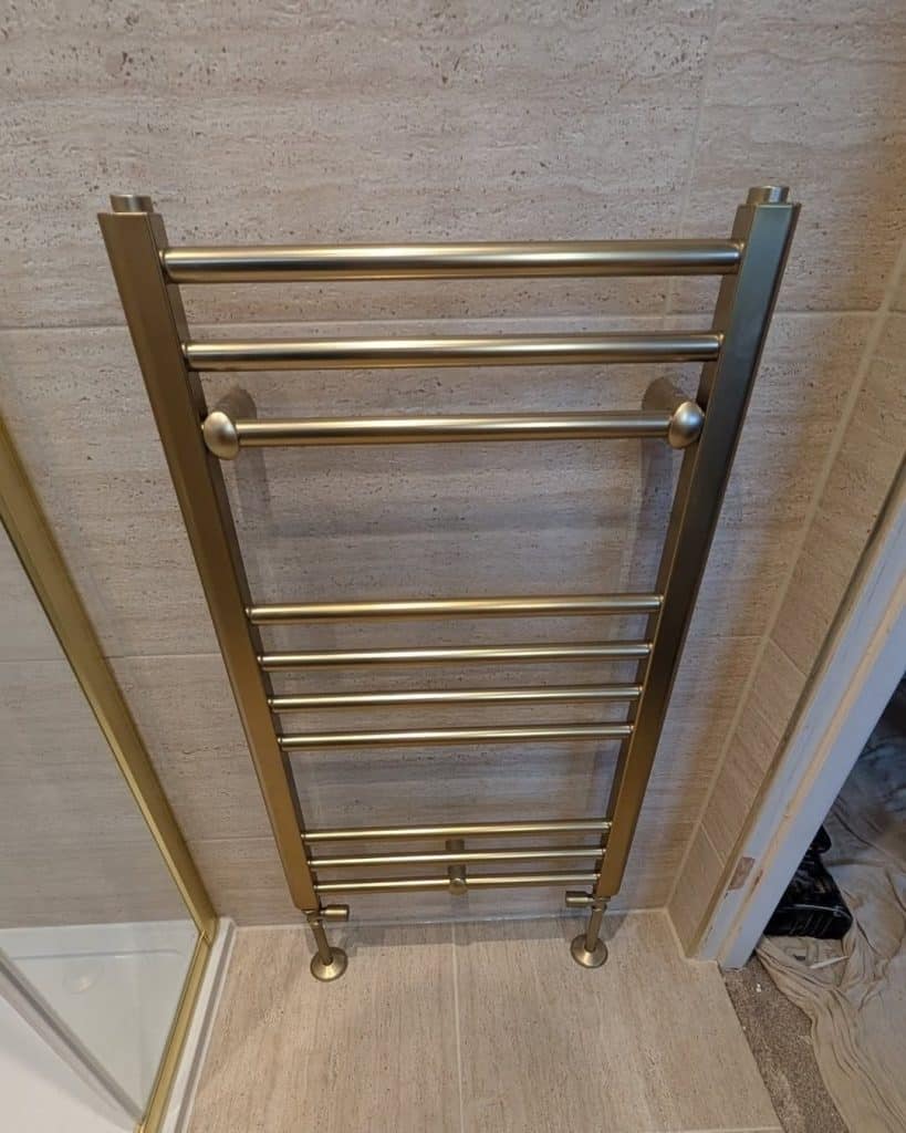 Bathroom Fitters in Paisley 4 Brushed brass heated towel rail in a Paisley en-suite